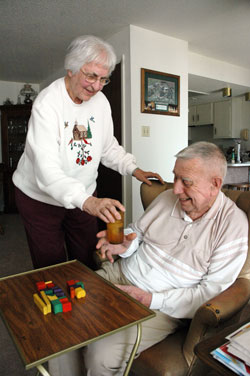 St. Therese of the Infant Jesus (Little Flower) parishioners Jerry and Mary Erlenbaugh of Indianapolis have seen their marriage and daily life change dramatically since he was diagnosed with Alzheimer’s disease in 2006. She is looking forward to attending a retreat for caregivers based on the Serenity Prayer from 8 a.m. to 3:30 p.m. on April 30 at the Benedict Inn Retreat and Conference Center in Beech Grove. The retreat is for both personal and professional caregivers. (Photo by Mary Ann Wyand) 