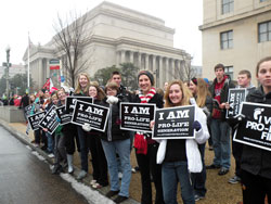 Youths from the Archdiocese of Indianapolis show their smiles and their support of life in the moments before they participate in the annual March for Life in Washington on Jan. 23. (Submitted photo)