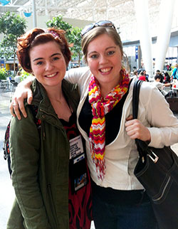 Lauren, left, and Erin Gahimer of SS. Francis and Clare of Assisi Parish in Greenwood share a rare moment together during a year when the two sisters have traveled to different parts of the world to help others. (Submitted photo)