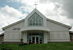 Sitting atop a hill on the grounds of Holy Angels Parish in Indianapolis, its new brick church—nine years in the making—is a testament to God’s grace, parish leaders say. (Photo by John Shaughnessy)