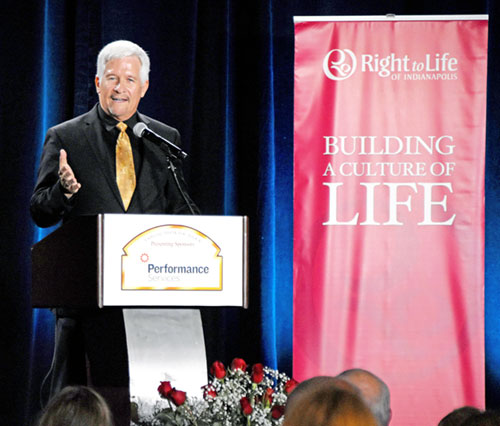 Editorial cartoonist Gary Varvel presents his keynote address during the RTLI Celebrate Life dinner at the Indianapolis Marriott Downtown on Oct. 1. (Photo by Natalie Hoefer)