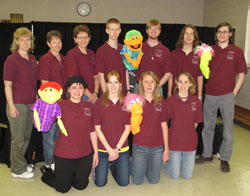 Members and leaders of the advanced Hands of JOY group include, front row, Shannan Schrum, Carrie Schnautz, Danielle Schmitt, Jessica Vaal, second row, Patty Schnautz, Shirley Tillman, Cindy Schmitt, Ken Schnautz, Rob Schnautz, Alex Miller and Aaron Sather.)