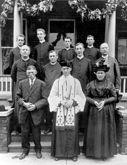 Father Bernard Reidford is shown with his parents John and Frances (Rexing) Reidford in this undated photo at St. Joseph parish in Vanderburgh County. A chalice, presented to him in 1911 by his parents, is now being used by Father Alex Zenthoefer. “This June, I am celebrating the ninety-ninth birthday of my chalice,” Father Alex said. He’s the assistant pastor at Holy Rosary Church and chaplain at Memorial High School, both in Evansville, and diocesan director of Vocations.